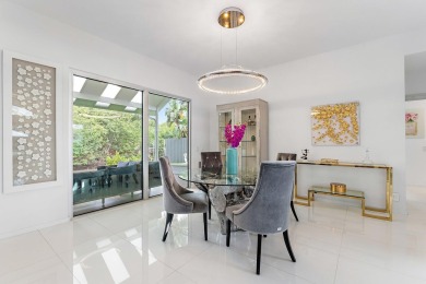 Welcome to this beautiful modern waterfront home with private on The Bears Club in Florida - for sale on GolfHomes.com, golf home, golf lot