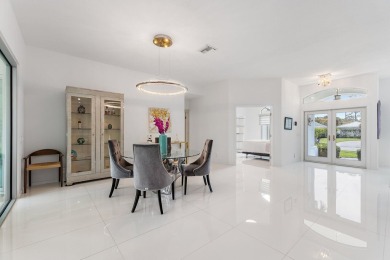 Welcome to this beautiful modern waterfront home with private on The Bears Club in Florida - for sale on GolfHomes.com, golf home, golf lot