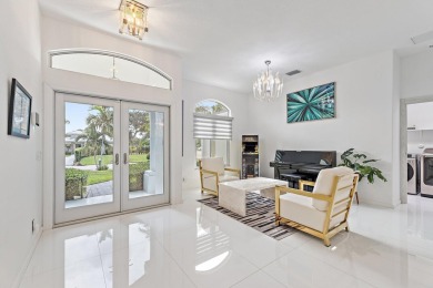 Welcome to this beautiful modern waterfront home with private on The Bears Club in Florida - for sale on GolfHomes.com, golf home, golf lot