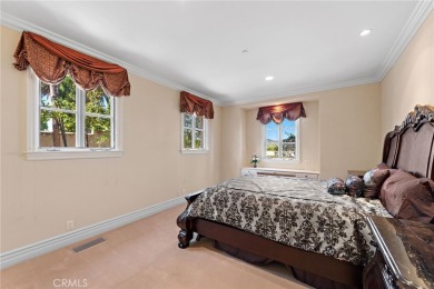 Indulge in elegant coastal living at this opulent ocean-view on Pelican Hill Golf Club in California - for sale on GolfHomes.com, golf home, golf lot