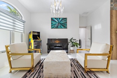Welcome to this beautiful modern waterfront home with private on The Bears Club in Florida - for sale on GolfHomes.com, golf home, golf lot