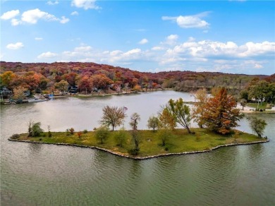 MOTIVATED SELLER! If you're looking for a place where every day on Lake of the Forest Golf Course in Kansas - for sale on GolfHomes.com, golf home, golf lot