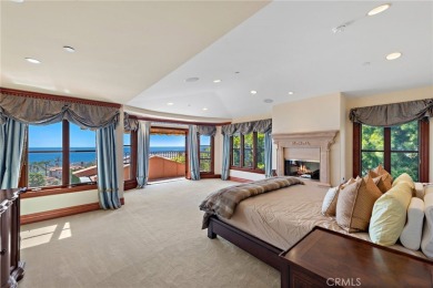 Indulge in elegant coastal living at this opulent ocean-view on Pelican Hill Golf Club in California - for sale on GolfHomes.com, golf home, golf lot