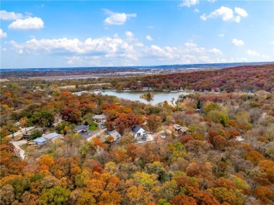 MOTIVATED SELLER! If you're looking for a place where every day on Lake of the Forest Golf Course in Kansas - for sale on GolfHomes.com, golf home, golf lot