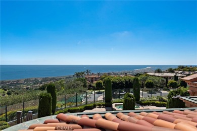 Indulge in elegant coastal living at this opulent ocean-view on Pelican Hill Golf Club in California - for sale on GolfHomes.com, golf home, golf lot