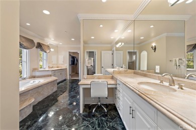 Indulge in elegant coastal living at this opulent ocean-view on Pelican Hill Golf Club in California - for sale on GolfHomes.com, golf home, golf lot