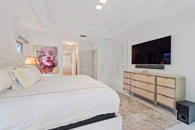 Welcome to this beautiful modern waterfront home with private on The Bears Club in Florida - for sale on GolfHomes.com, golf home, golf lot