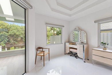 Welcome to this beautiful modern waterfront home with private on The Bears Club in Florida - for sale on GolfHomes.com, golf home, golf lot