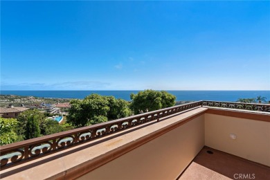 Indulge in elegant coastal living at this opulent ocean-view on Pelican Hill Golf Club in California - for sale on GolfHomes.com, golf home, golf lot