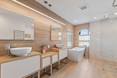 Welcome to this beautiful modern waterfront home with private on The Bears Club in Florida - for sale on GolfHomes.com, golf home, golf lot