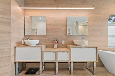 Welcome to this beautiful modern waterfront home with private on The Bears Club in Florida - for sale on GolfHomes.com, golf home, golf lot