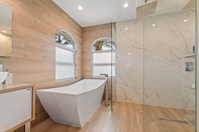Welcome to this beautiful modern waterfront home with private on The Bears Club in Florida - for sale on GolfHomes.com, golf home, golf lot