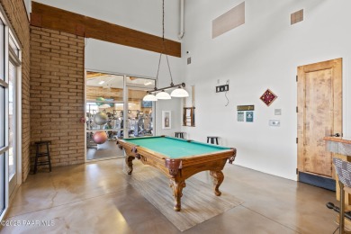This beautifully updated 3-bedroom, 2-bathroom residence on Quail Wood Greens Golf Course in Arizona - for sale on GolfHomes.com, golf home, golf lot