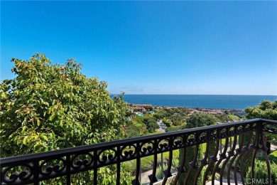 Indulge in elegant coastal living at this opulent ocean-view on Pelican Hill Golf Club in California - for sale on GolfHomes.com, golf home, golf lot