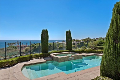 Indulge in elegant coastal living at this opulent ocean-view on Pelican Hill Golf Club in California - for sale on GolfHomes.com, golf home, golf lot