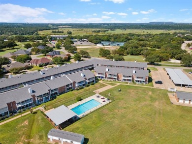 The Fairway Condominiums, located in the country club community on Pecan Plantation Country Club in Texas - for sale on GolfHomes.com, golf home, golf lot