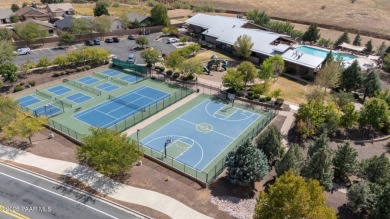 This beautifully updated 3-bedroom, 2-bathroom residence on Quail Wood Greens Golf Course in Arizona - for sale on GolfHomes.com, golf home, golf lot