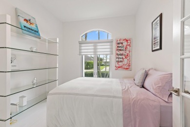 Welcome to this beautiful modern waterfront home with private on The Bears Club in Florida - for sale on GolfHomes.com, golf home, golf lot