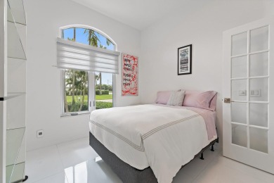 Welcome to this beautiful modern waterfront home with private on The Bears Club in Florida - for sale on GolfHomes.com, golf home, golf lot