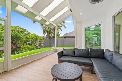 Welcome to this beautiful modern waterfront home with private on The Bears Club in Florida - for sale on GolfHomes.com, golf home, golf lot