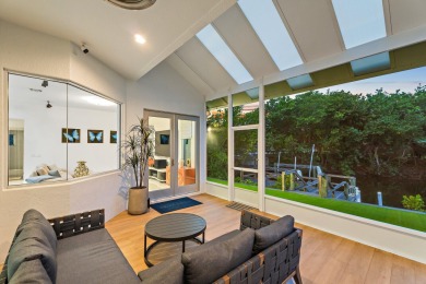 Welcome to this beautiful modern waterfront home with private on The Bears Club in Florida - for sale on GolfHomes.com, golf home, golf lot