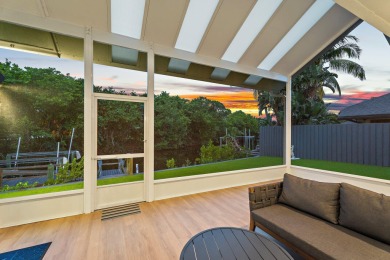 Welcome to this beautiful modern waterfront home with private on The Bears Club in Florida - for sale on GolfHomes.com, golf home, golf lot