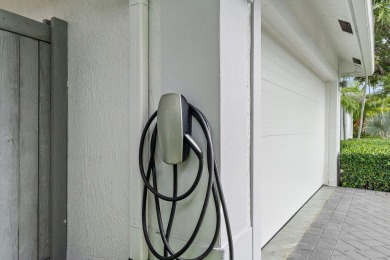 Welcome to this beautiful modern waterfront home with private on The Bears Club in Florida - for sale on GolfHomes.com, golf home, golf lot