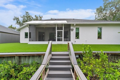 Welcome to this beautiful modern waterfront home with private on The Bears Club in Florida - for sale on GolfHomes.com, golf home, golf lot