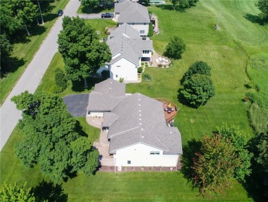 Discover luxurious living in this stunning 5-bedroom, 4-bathroom on Geneva Golf Club in Minnesota - for sale on GolfHomes.com, golf home, golf lot