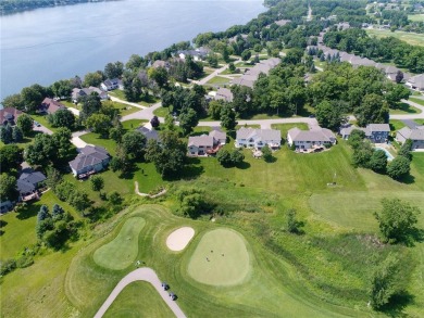 Discover luxurious living in this stunning 5-bedroom, 4-bathroom on Geneva Golf Club in Minnesota - for sale on GolfHomes.com, golf home, golf lot