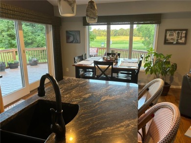 Discover luxurious living in this stunning 5-bedroom, 4-bathroom on Geneva Golf Club in Minnesota - for sale on GolfHomes.com, golf home, golf lot