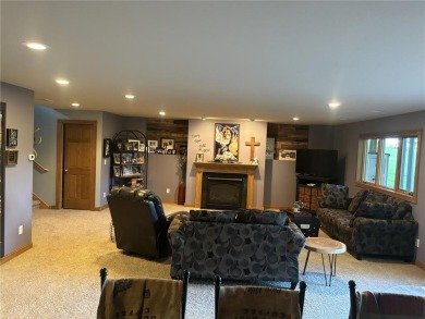 Discover luxurious living in this stunning 5-bedroom, 4-bathroom on Geneva Golf Club in Minnesota - for sale on GolfHomes.com, golf home, golf lot