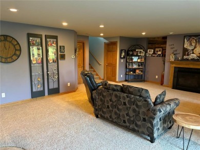 Discover luxurious living in this stunning 5-bedroom, 4-bathroom on Geneva Golf Club in Minnesota - for sale on GolfHomes.com, golf home, golf lot