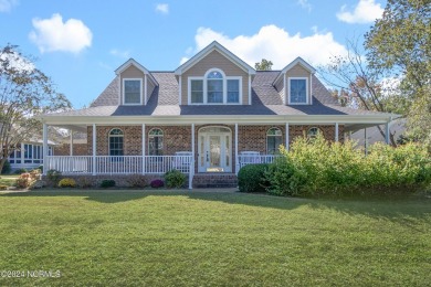 Come see this beautiful brick home in a prime convenient on Sound Golf Links at Albemarle Plantation in North Carolina - for sale on GolfHomes.com, golf home, golf lot