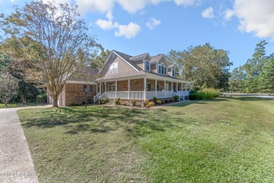 Come see this beautiful brick home in a prime convenient on Sound Golf Links at Albemarle Plantation in North Carolina - for sale on GolfHomes.com, golf home, golf lot