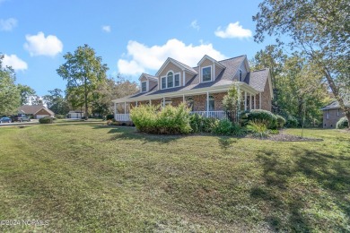 Come see this beautiful brick home in a prime convenient on Sound Golf Links at Albemarle Plantation in North Carolina - for sale on GolfHomes.com, golf home, golf lot