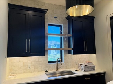 Custom built by Starr Homes. This is a model and not for sale on Staley Farms Golf Club in Missouri - for sale on GolfHomes.com, golf home, golf lot