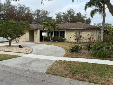 Won't last priced @ $233/sqft! This home did have some water on Feather Sound Country Club in Florida - for sale on GolfHomes.com, golf home, golf lot