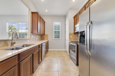 Welcome to this charming Key West-style residence nestled in the on Reunion Resort Golf Course in Florida - for sale on GolfHomes.com, golf home, golf lot