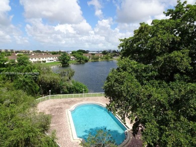 Relaxing Lake View,Assigned Parking, Beautiful 2/1.5, 2-story on Fontainebleau Golf Course in Florida - for sale on GolfHomes.com, golf home, golf lot