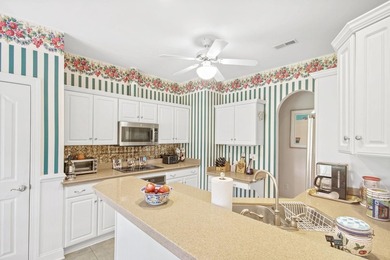 Seize the rare opportunity to own an architectural designed home on Wedgefield Plantation Golf Club in South Carolina - for sale on GolfHomes.com, golf home, golf lot