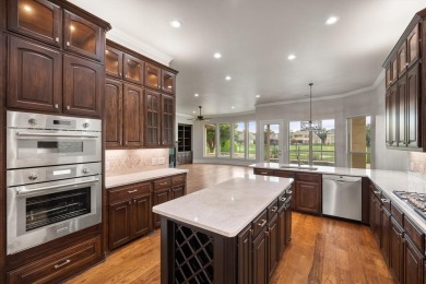 Stunning, completely remodeled Mediterranean-style home sits on on Timarron Country Club in Texas - for sale on GolfHomes.com, golf home, golf lot