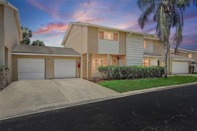 Nestled within the serene waterfront Mariners Pass community on Mangrove Bay Golf Course in Florida - for sale on GolfHomes.com, golf home, golf lot