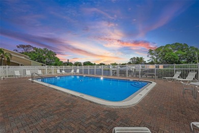 Nestled within the serene waterfront Mariners Pass community on Mangrove Bay Golf Course in Florida - for sale on GolfHomes.com, golf home, golf lot