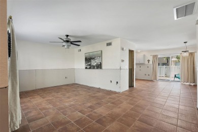 Nestled within the serene waterfront Mariners Pass community on Mangrove Bay Golf Course in Florida - for sale on GolfHomes.com, golf home, golf lot