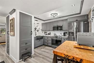STUNNING!  This renovated condo is simply stunning!  Located in on East Lake Woodlands Country Club in Florida - for sale on GolfHomes.com, golf home, golf lot