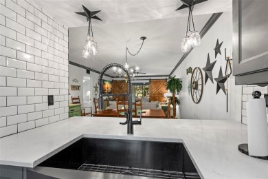 STUNNING!  This renovated condo is simply stunning!  Located in on East Lake Woodlands Country Club in Florida - for sale on GolfHomes.com, golf home, golf lot