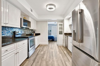 Fully renovated 3BD/2BA two-story condo featuring designer-style on Boca Pointe Country Club in Florida - for sale on GolfHomes.com, golf home, golf lot