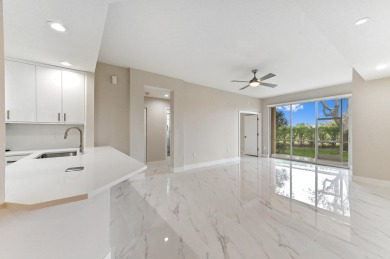 Introducing a sophisticatedly updated residence at 12454 Crystal on Westchester Golf and Country Club in Florida - for sale on GolfHomes.com, golf home, golf lot