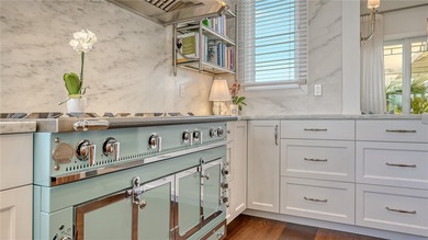 Two-level penthouse residences at Tangerine Bay Club are rarely on Links on Longboat Golf Club in Florida - for sale on GolfHomes.com, golf home, golf lot